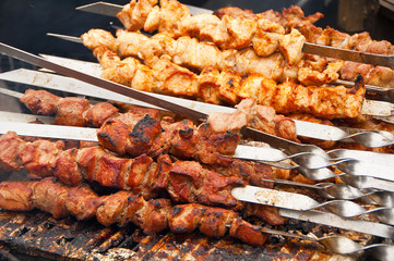 Pork and chicken shish kebab on skewers
