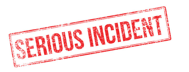Serious incident red rubber stamp on white