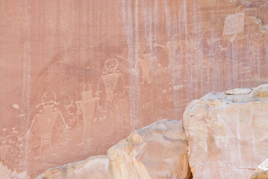Ancient petroglyphs from the Fremont people on canyon wall, Capitol Reef National Park, Utah