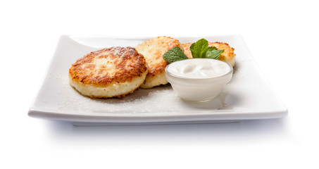 Cottage cheese pancakes with sour cream