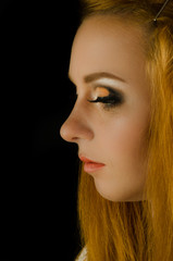 Perfect portrait  red-hair girl in the studio