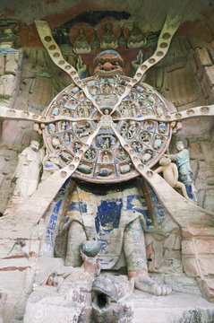 Tibetan Buddhist wheel of life rock sculpture at Dazu Rock Carvings, Chongqing Municipality, Fujian Province, China