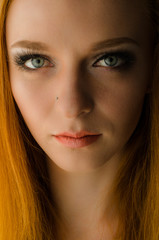 Fototapeta premium Perfect portrait red-hair girl in the studio