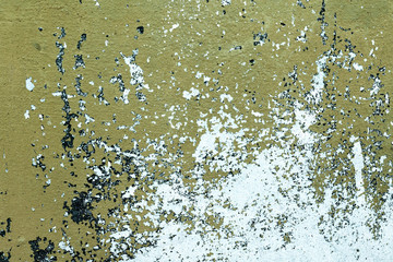 Wall fragment with scratches and cracks