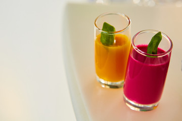 Set of different vegetable juices on the bar.