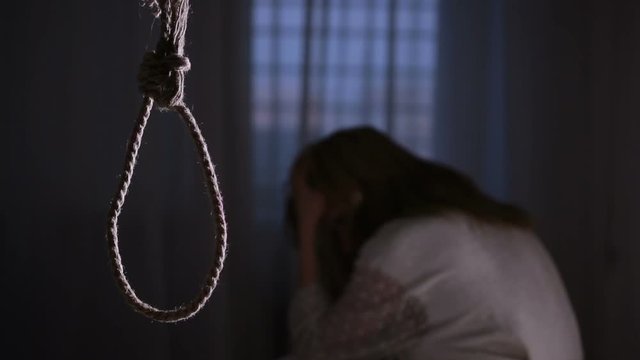 suicide. Girl on the background of the loop for the neck.