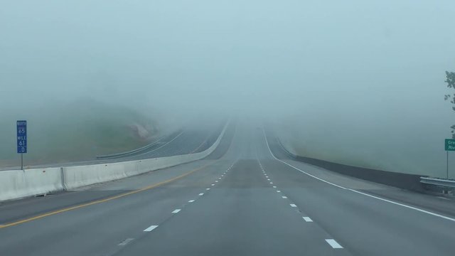 driving on a foggy road 