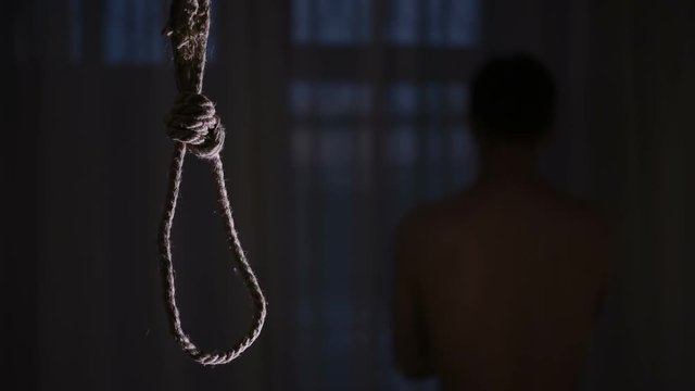suicide. man on the background of the loop for the neck.