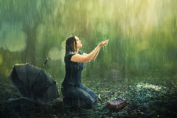 Woman and rain shower - Powered by Adobe