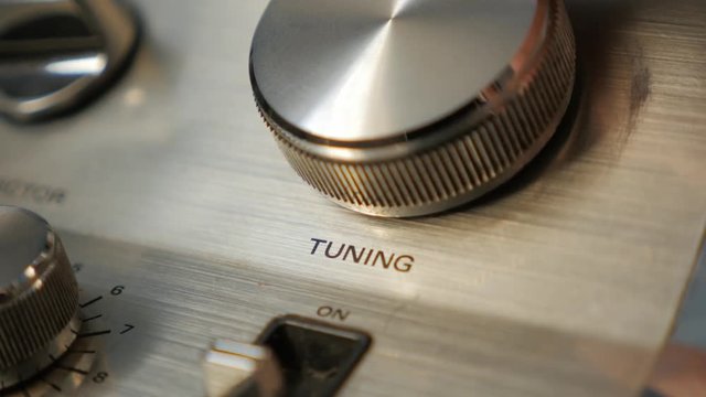 Tuning radio stations on ancient tuner wheel dial 4K 2160p UltraHD footage - Frequency changing on radio jog dial wheel 4K 3840X2160 30fps UHD video