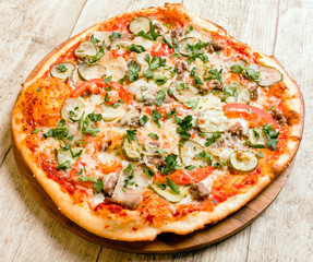 pizza on the wood background