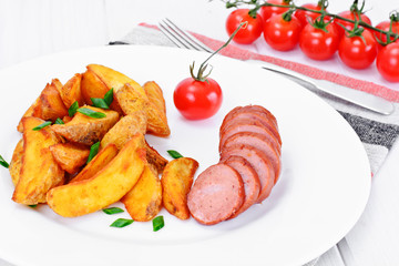 Fried Potato Wedges in a Rural and Sausage