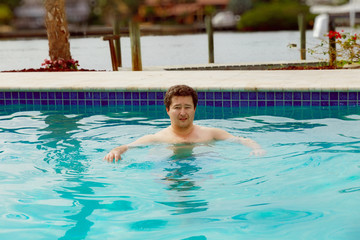 Poolman swimming in the pool