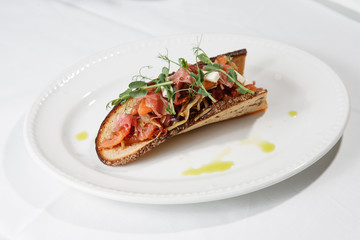 Cabbage snack with bacon on sour-sweet bread