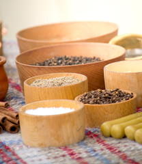 Spices in wooden bowls