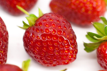 Line of red strawberries