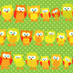Fototapeta premium Seamless pattern with cute owls on green dotted background.