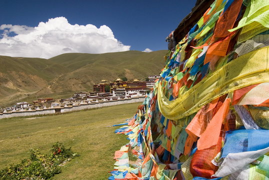 Monastery and prayer flags, Litang, Sichuan, China