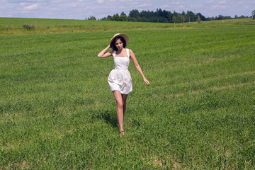 Fototapeta na wymiar young girl in white dress
