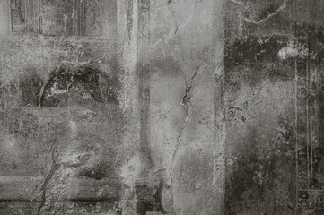A fragment of aged mural wall of the ancient house in Pompeii, Italy. Ancient wall in Pompeii, Italy. Remains of mural painting paintings. Background. - obrazy, fototapety, plakaty