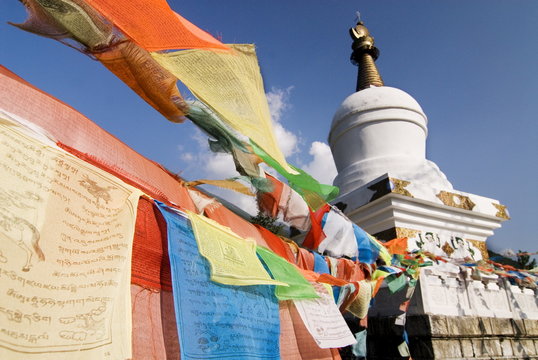 Buddhist prayer flags and stupa atop Paoma Shan, Kanding, Sichuan, China