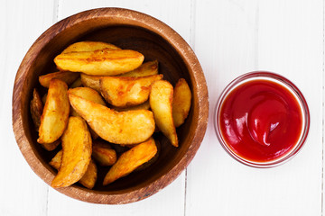 Potato Wedges, Potatoes in a Rural with Tomato Ketchup