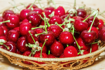 Fresh cherries in water drops