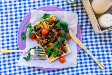 Belgian waffle with grilled mushrooms, eggplant, cherry tomatoes and parsley