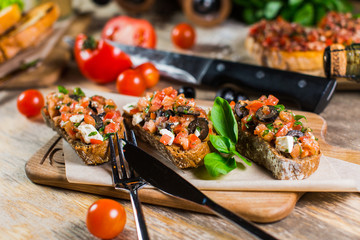 Beautiful fresh sandwiches with feta cheese, tomatoes and Basil