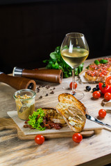 Beautiful fresh sandwiches with meat pate, cherry tomato and lettuce