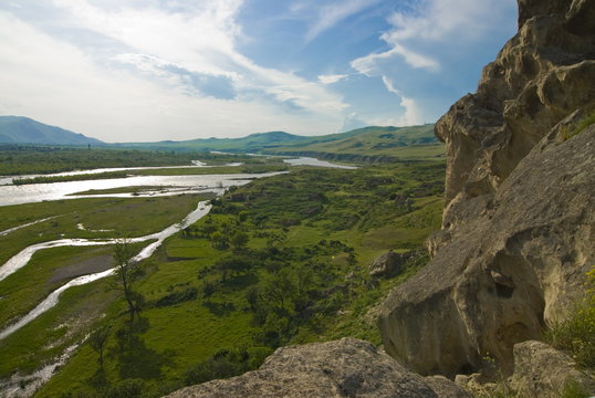 View over the Mtkvari River together with the Cave city of Uplistsikhe, near Gori, Georgia, Caucasus