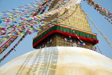 Bodnath stupa with Buddha eyes and prayer flags in Kathmandu, Nepal