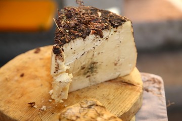 cheese called drunkard with marc and raisins - obrazy, fototapety, plakaty