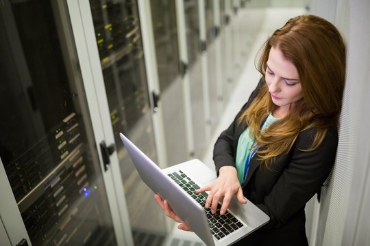 Technician using laptop
