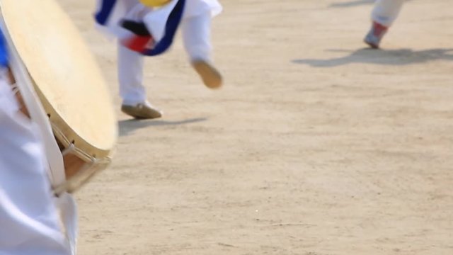 Performers playing traditional Korean music, the nongak, also known as the farmers music at Yeouido cherry blossom festival in Seoul, South Korea 