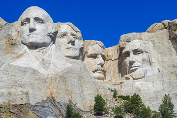 Mount Rushmore National Memorial - sculpture with faces of four American Presidents: Washington, Jefferson, Roosevelt, and Lincoln, at Keystone, South  Dakota - 113121795