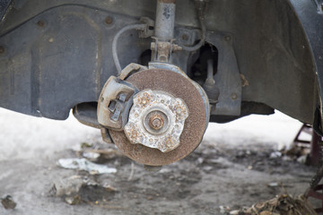 Old brake disc useless with rusty without tire.