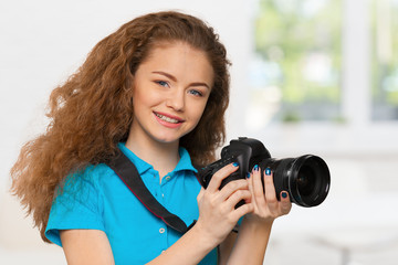 Woman photographer with camera