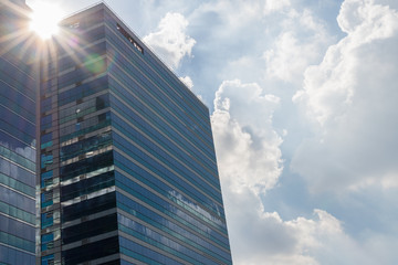 Fototapeta na wymiar Glass building with blue sky