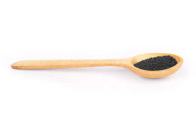 spices in a wooden spoon on a white background