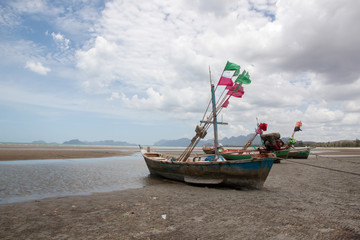 Fototapeta na wymiar boat local fishing wood on a mooring
