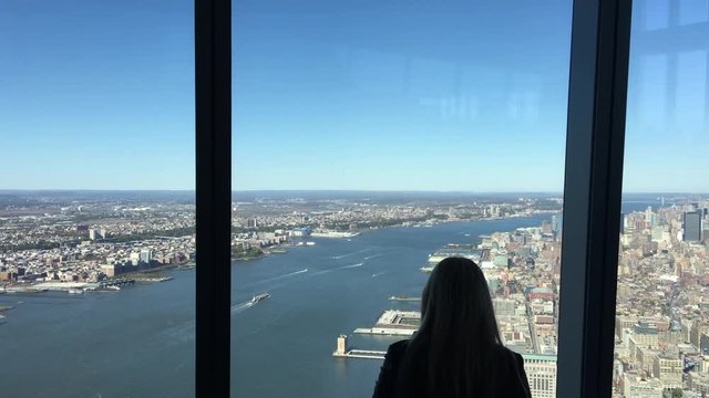 NEW YORK CITY - CIRCA OCTOBER, 2015: Tourists enjoy city view from Freedom Tower. It is the main tower of World Trade Center