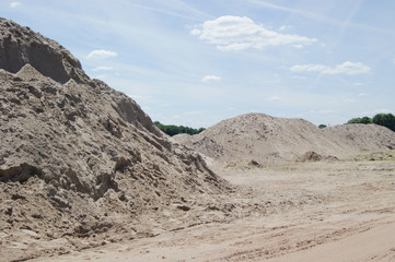 Sand for construction from the bottom of the river, loading cranes.