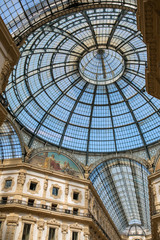 View of the glass dome at Galleria Vittorio Emanuele II, which is one of the world's oldest shopping malls, housed within a four-story double arcade in central Milan.