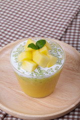 Thai dessert of tapioca pearls pudding with mango