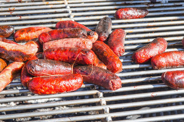 Chorizo and sausages on grill