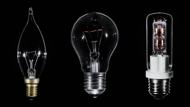 Collage of 3 Edison lamps blinking over black background, macro view, looped video