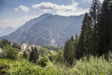 Green landscape of foothills of the Alps