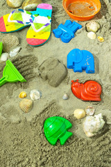 Fototapeta na wymiar Beach toys in the sand