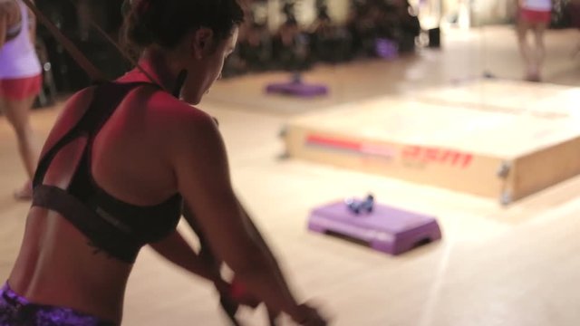Backshot of woman workout with stripes